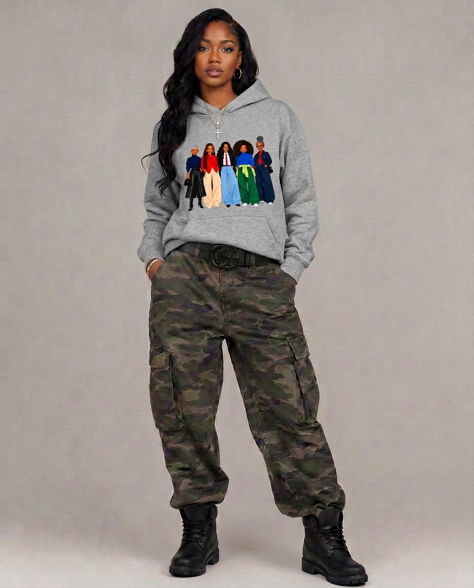 Model wearing the grey Sisterhood Edit hoodie with camouflage cargo pants