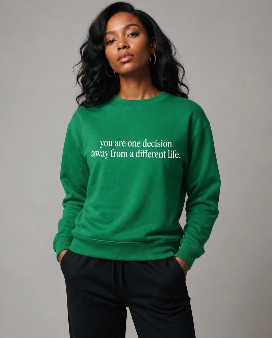 Model in the green You Are One Decision crewneck sweatshirt